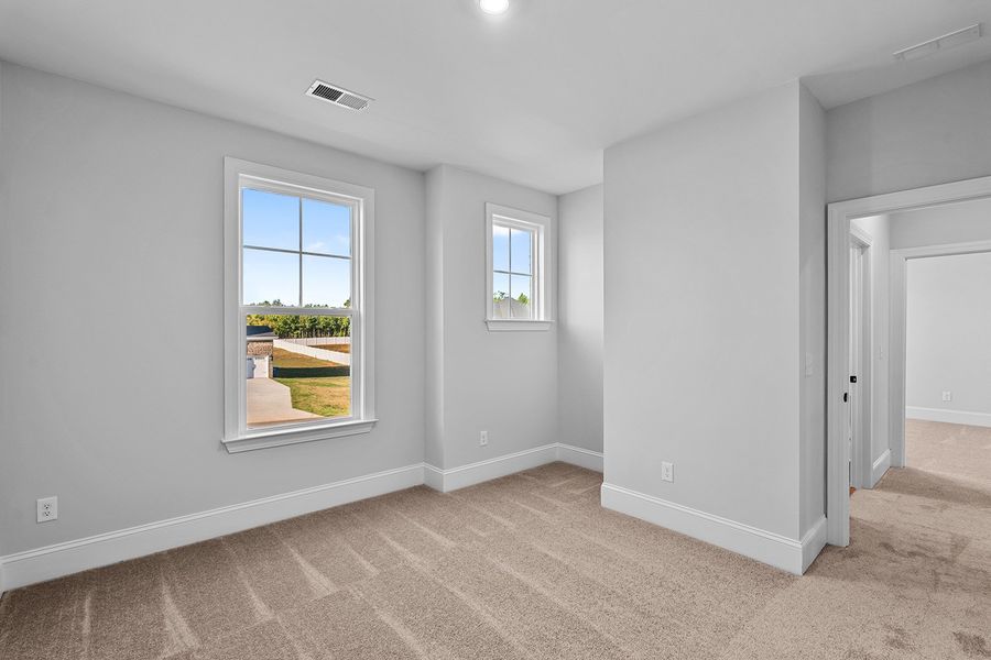 Spacious, unfurnished interior of a new home in Lilah Grove, Summerfield (Image 35).