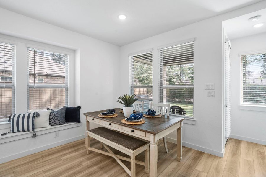 Dining area with view to the backyard Dining area with view to the backyard