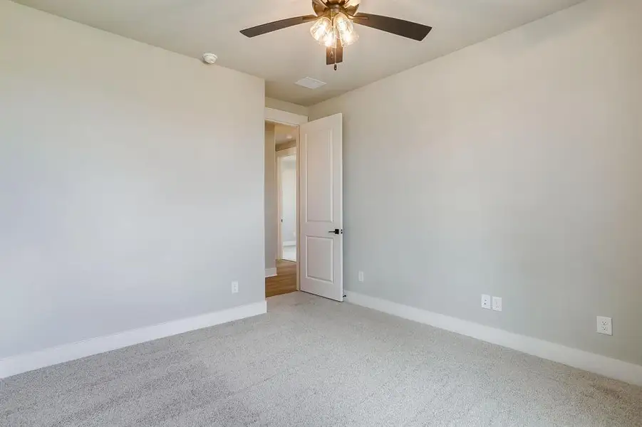 Spacious, unfurnished interior of a new home in Peaks at Lone Elm, Waxahachie (Image 18). Spacious, unfurnished interior of a new home in Peaks at Lone Elm, Waxahachie (Image 18).