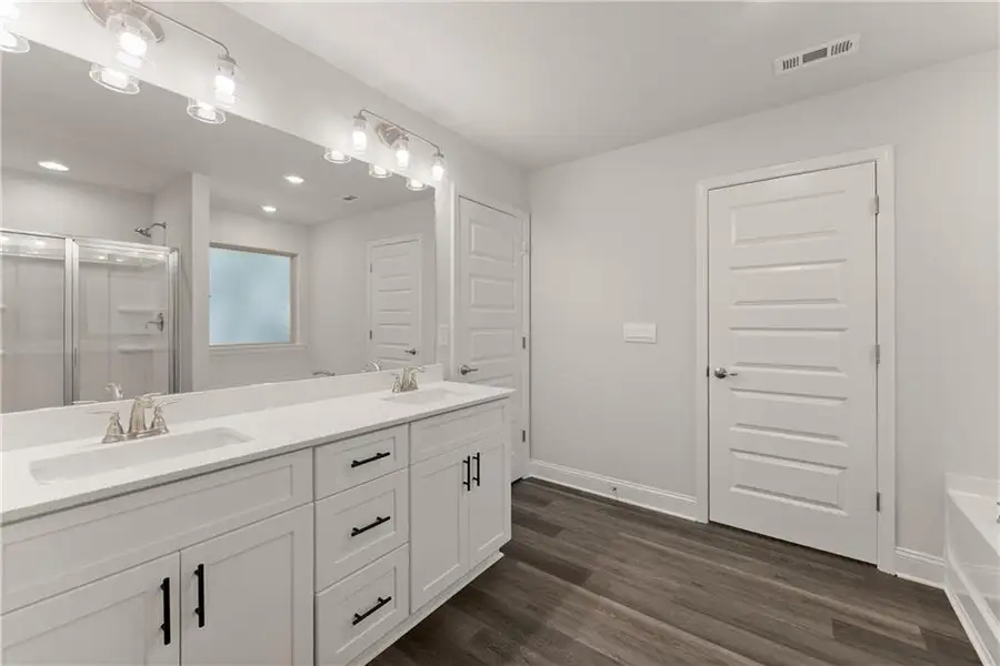 Furnished interior view inside a new home in Magnolia Villas, Cornelia (Image 9).