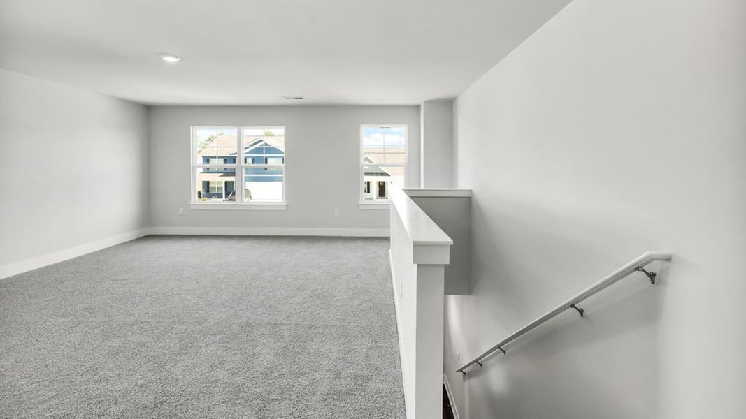 Spacious, unfurnished interior of a new home in Sidbury Station, Castle Hayne (Image 27).