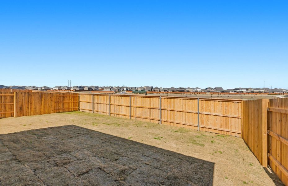 Exterior details and patio area of a home in Sunfield, Buda (Image 29).