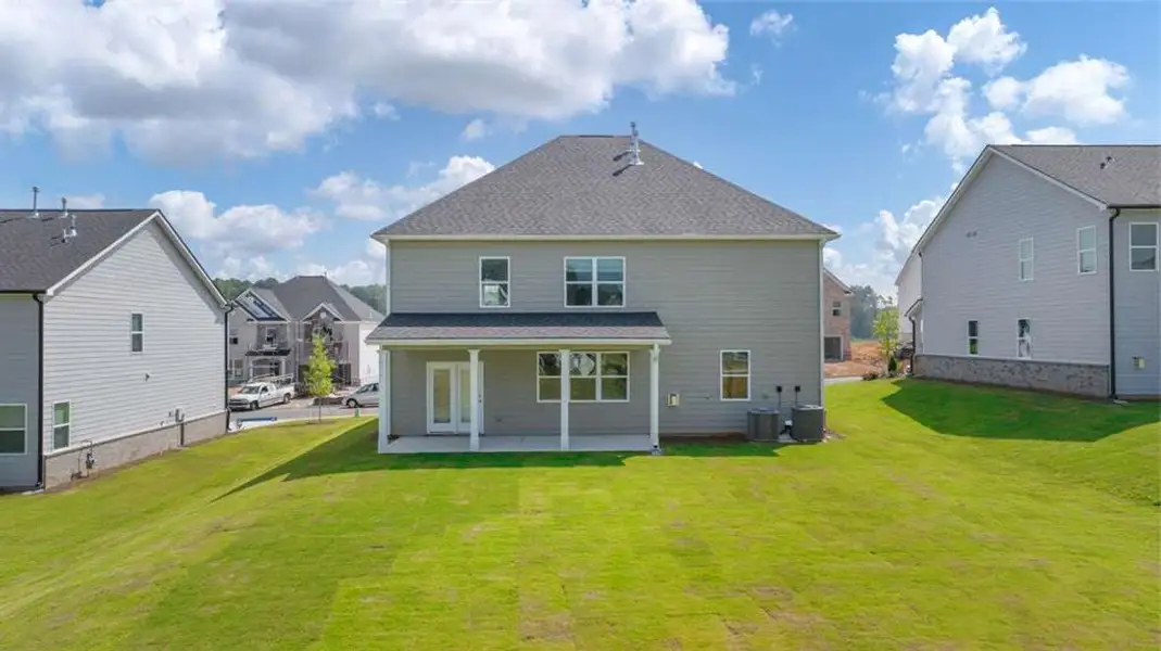 Exterior details and patio area of a home in Independence, Loganville (Image 4).