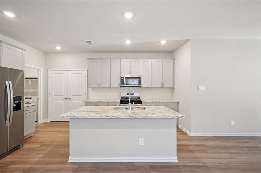 Photo is not of the actual home, but is an inspirational photo of builder’s model home and may depict options, furnishings, and/or decorator features that are not included.