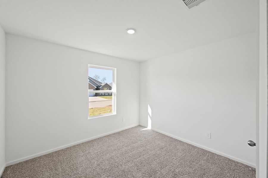 Spacious, unfurnished interior of a new home in The Canopies, Splendora (Image 16).
