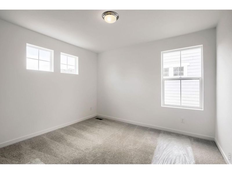 Spacious, unfurnished interior of a new home in Timber Lark, Fort Collins (Image 10).