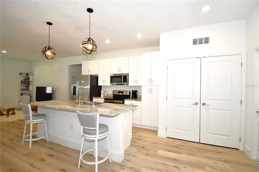Furnished interior view inside a new home in , Poinciana (Image 9). Furnished interior view inside a new home in , Poinciana (Image 9).