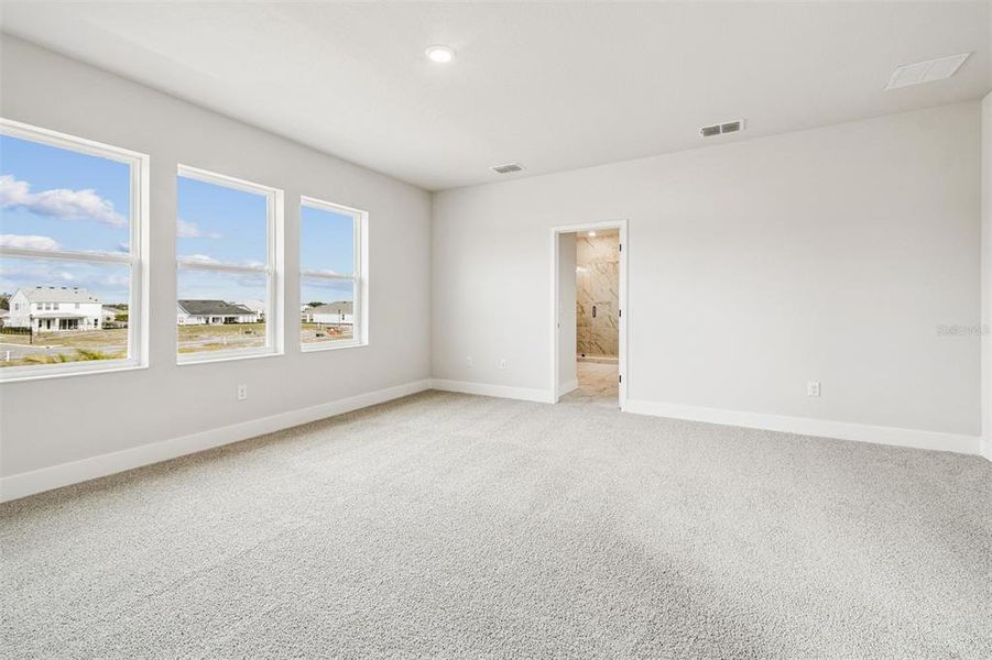 Spacious, unfurnished interior of a new home in Waterset Tradition Series, Apollo Beach (Image 38).