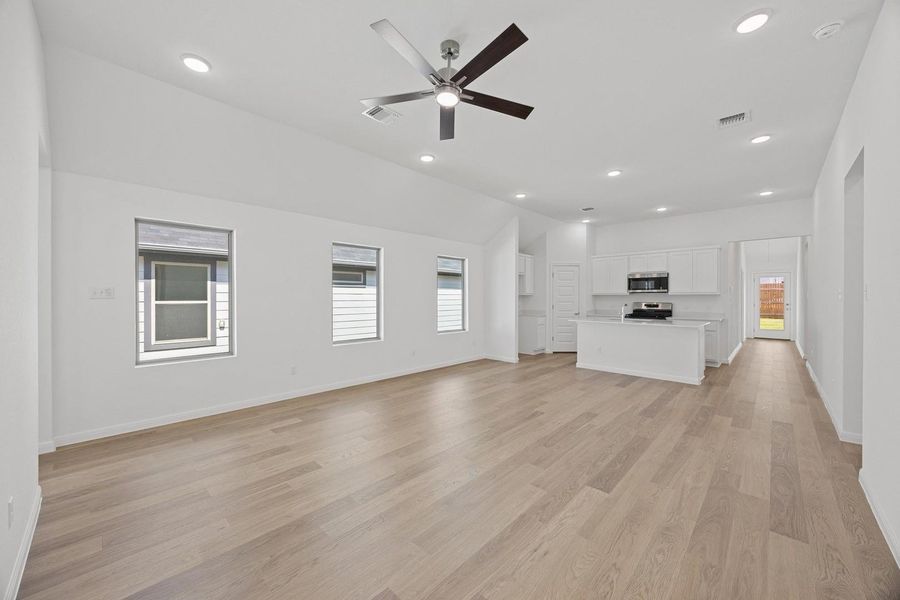 Living Area in the Cypress home plan by Trophy Signature Homes – REPRESENTATIVE PHOTO