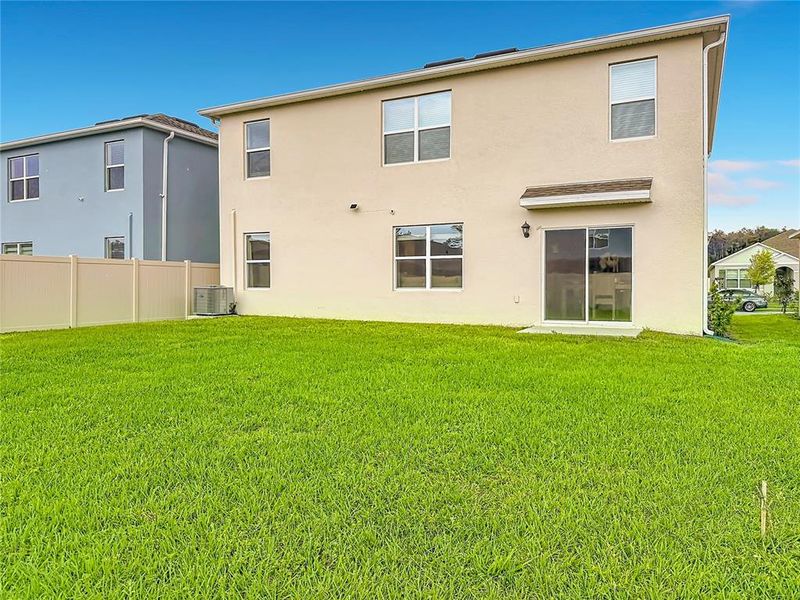 Exterior details and patio area of a home in Edgemont at Serenoa, Clermont (Image 27).