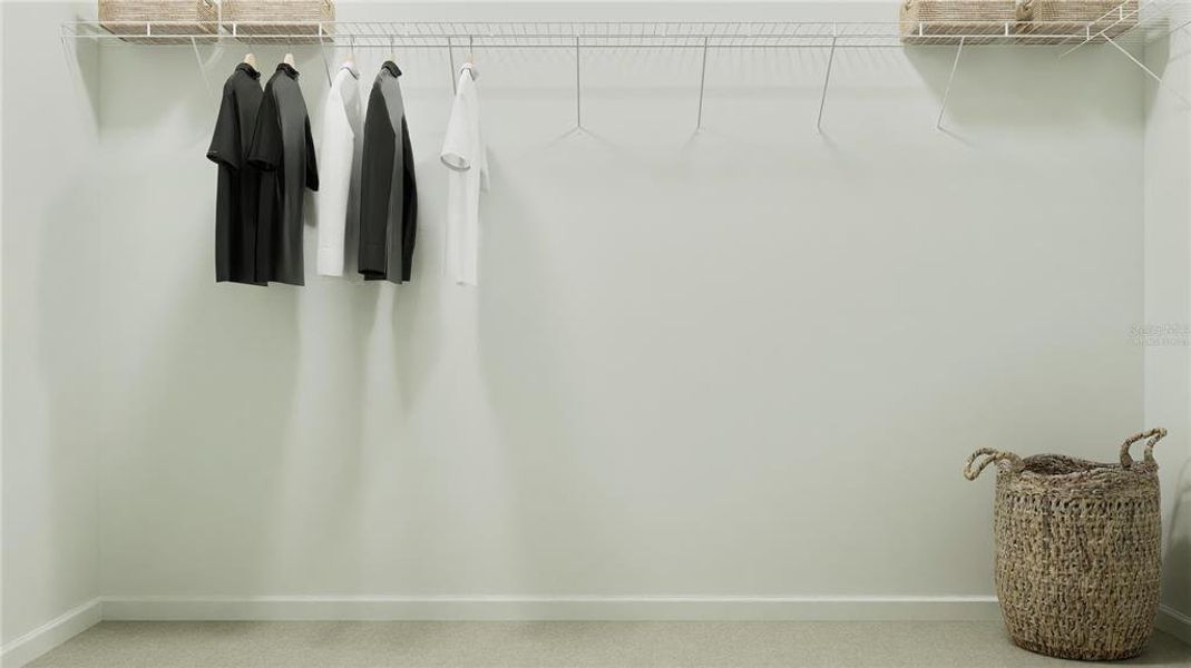 Virtually staged. Main bedroom walk in closet Virtually staged. Main bedroom walk in closet