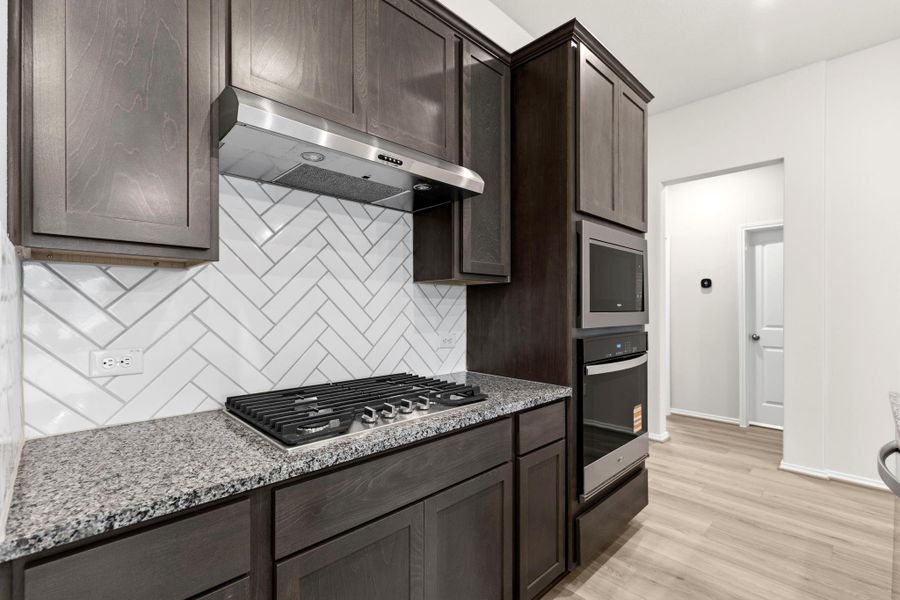 Furnished interior view inside a new home in Grand Central Park, Conroe (Image 7).