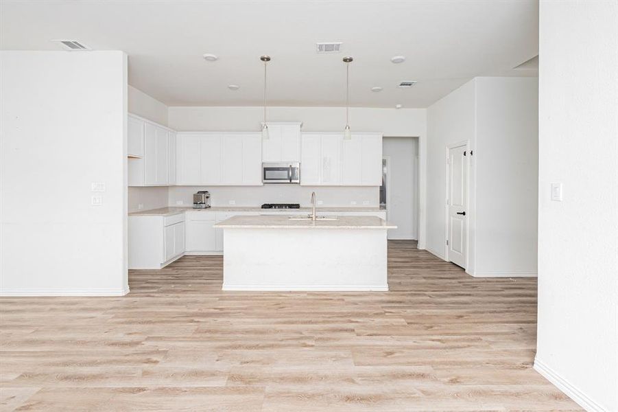Spacious, unfurnished interior of a new home in Woodstone, Providence Village (Image 8).