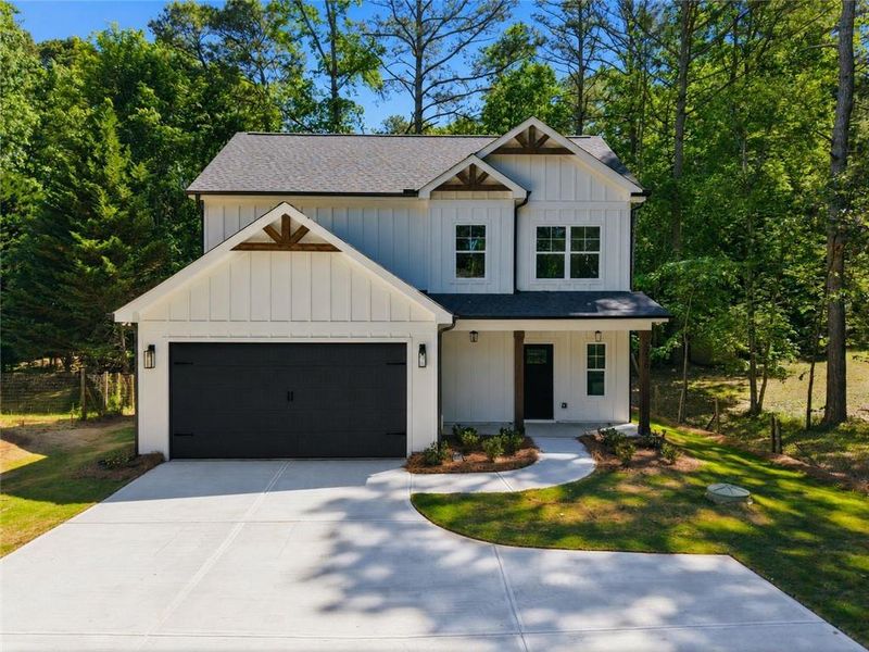 Front exterior of a new home in , Cumming, GA, highlighting curb appeal (Image 24).