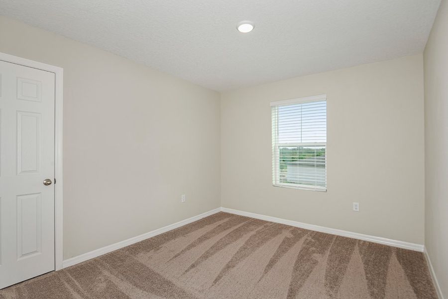 Spacious, unfurnished interior of a new home in Scenic Terrace, Haines City (Image 23).