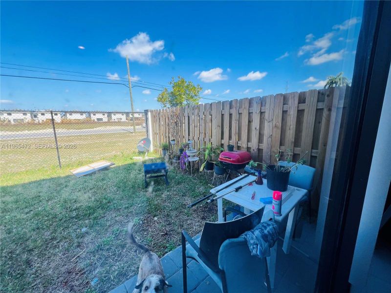 Exterior details and patio area of a home in , Homestead (Image 26). Exterior details and patio area of a home in , Homestead (Image 26).
