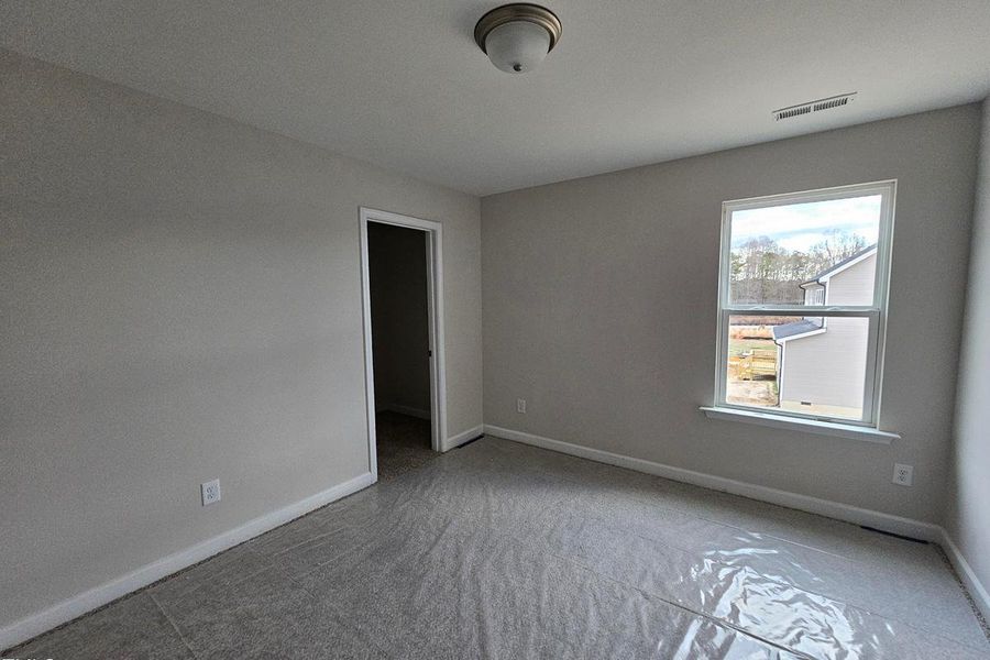 Spacious, unfurnished interior of a new home in Wellers Knoll, Lillington (Image 23). Spacious, unfurnished interior of a new home in Wellers Knoll, Lillington (Image 23).