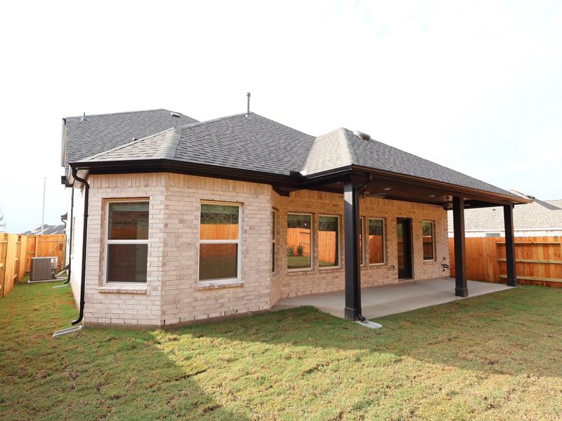 Exterior details and patio area of a home in Sorella, Tomball (Image 18).
