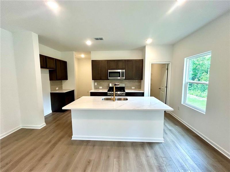 Furnished interior view inside a new home in The Pointe at Heron Bay, Locust Grove (Image 7).