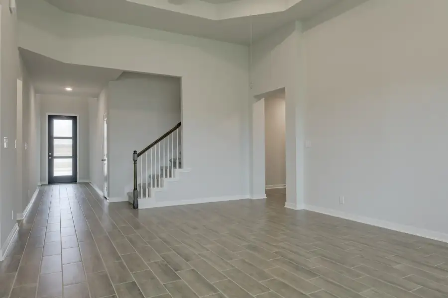 Representative unfurnished interior of a home built from the Guadalupe by Ashton Woods in Saddlebrook Ranch, Schertz (Image 21).