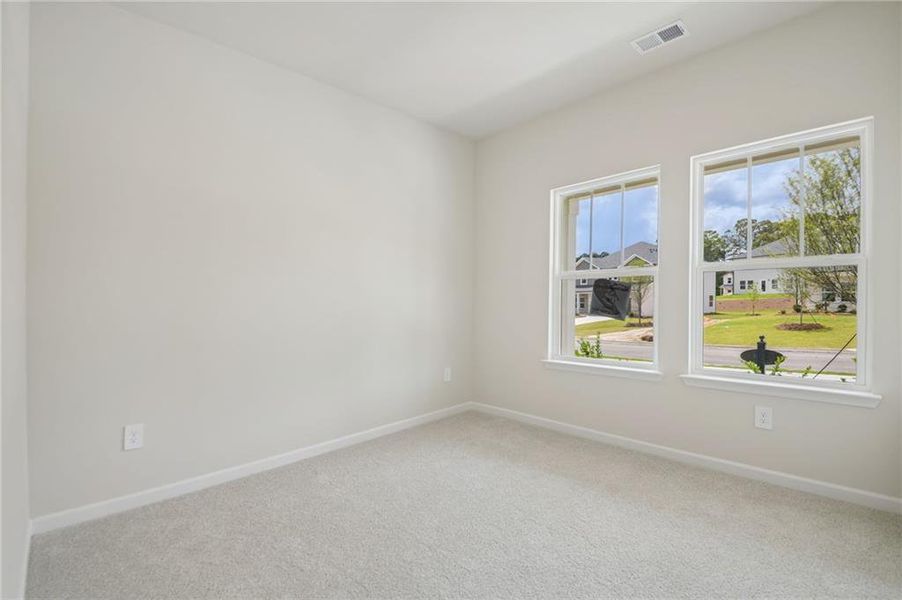 Spacious, unfurnished interior of a new home in Northwoods at Mirror Lake, Villa Rica (Image 32).