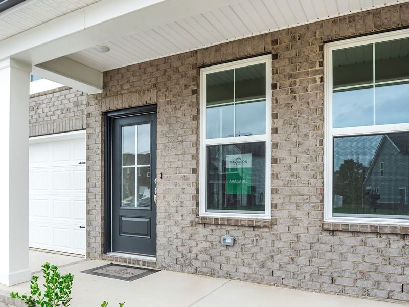 Exterior details and patio area of a home in Woods Crossing, Gallatin (Image 3).