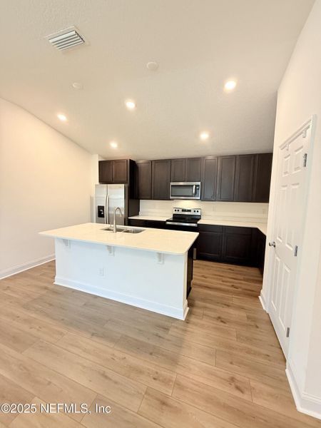 Furnished interior view inside a new home in Pinewood Place, Middleburg (Image 4).