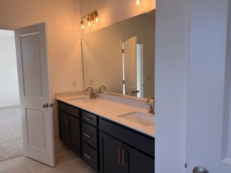 Bath 2 featuring the AW Collection® Sapphire - Clean lines and layered design pop with color.