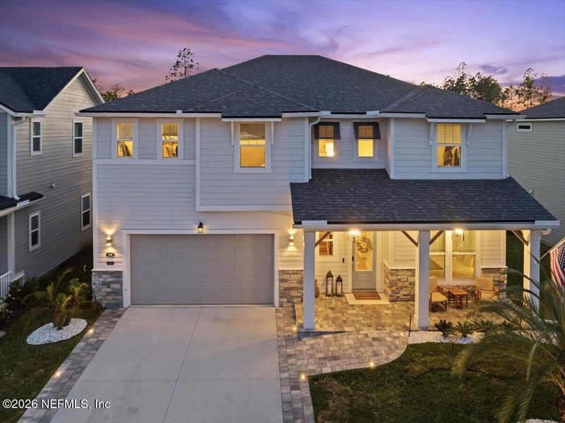 Front exterior of a new home in , St. Johns, FL, highlighting curb appeal (Image 23).