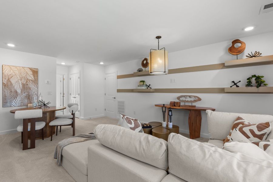 Representative furnished interior of a home built from the The Shorebreak by Chesapeake Homes in Terrapin, Leland (Image 52).