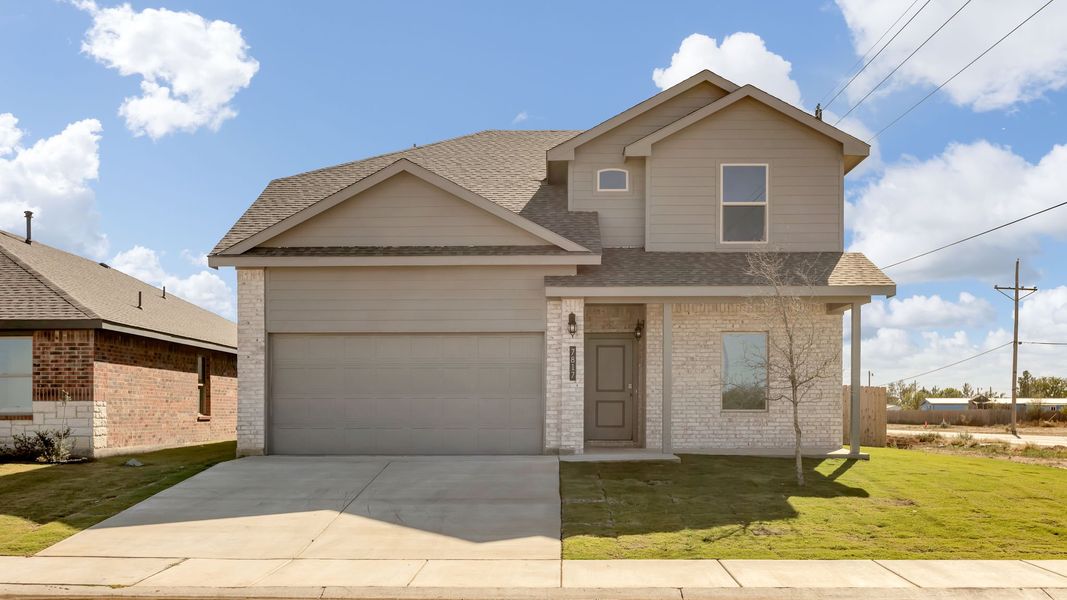 Front exterior of a new home in Everest Heights, Lubbock, TX, highlighting curb appeal (Image 2). Front exterior of a new home in Everest Heights, Lubbock, TX, highlighting curb appeal (Image 2).