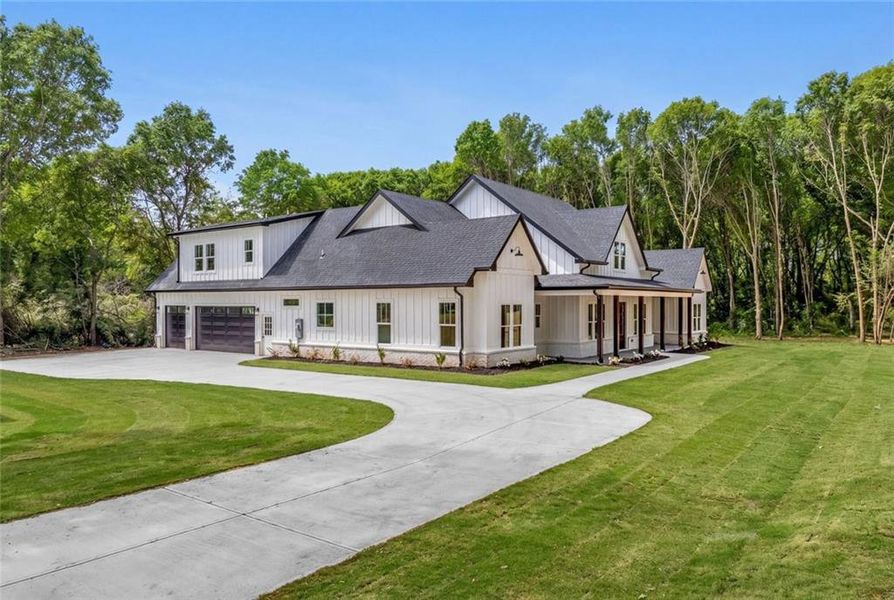 Front exterior of a new home in , Monroe, GA, highlighting curb appeal (Image 29).