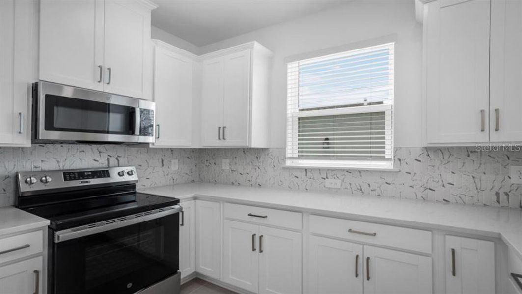 Furnished interior view inside a new home in The Cove at West Port, Port Charlotte (Image 7).