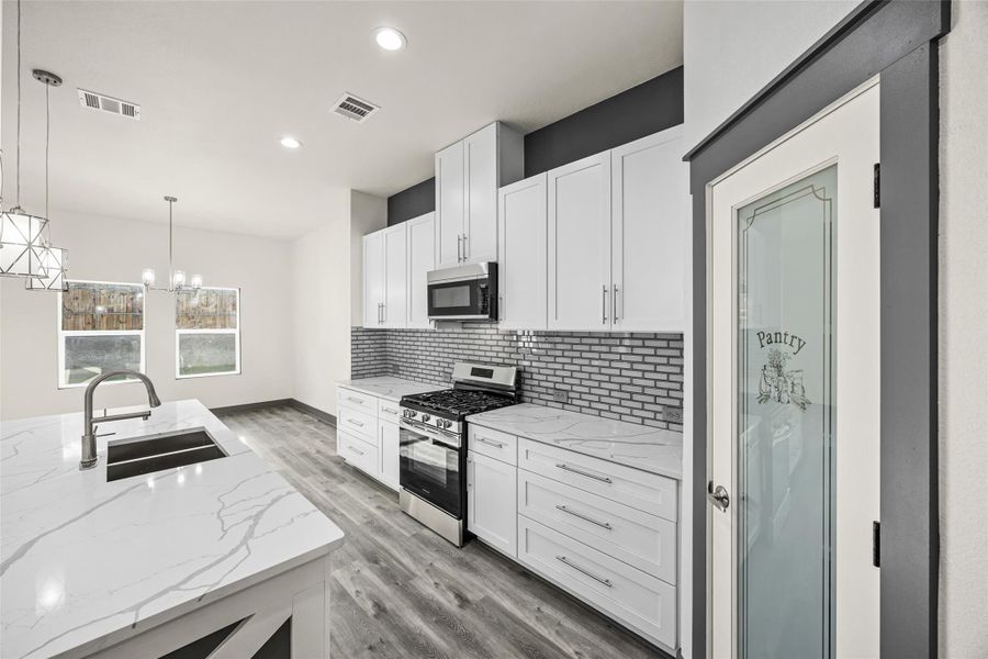 Furnished interior view inside a new home in , Conroe (Image 9).