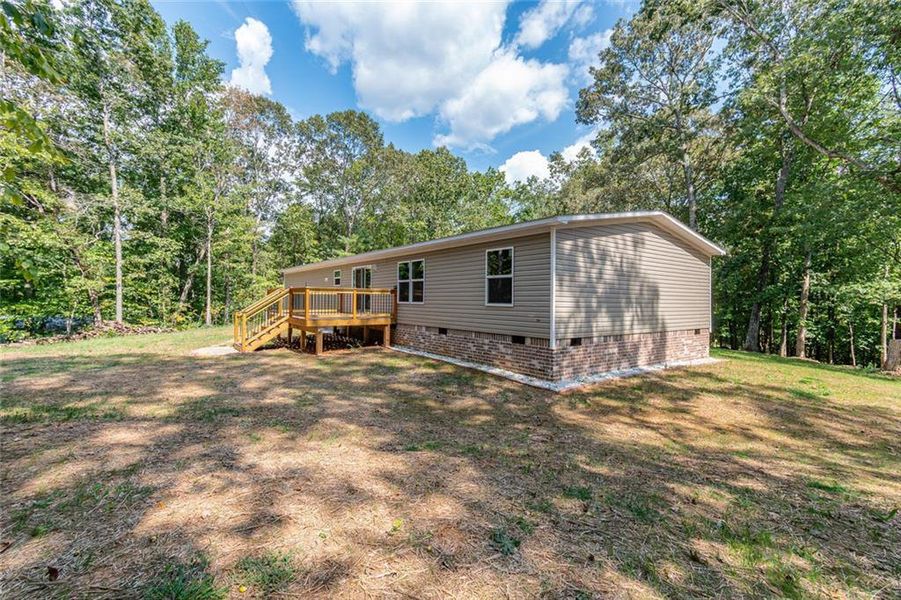 Exterior details and patio area of a home in , Dahlonega (Image 24).