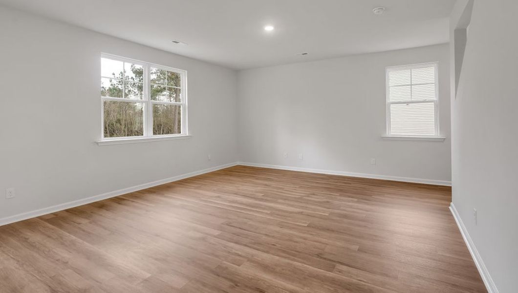 Representative unfurnished interior of a home built from the GLYNN by D.R. Horton in Grayson Park, Leland (Image 17).