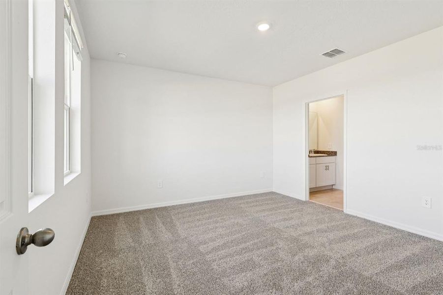 Spacious, unfurnished interior of a new home in Springs at Lake Alfred - Classic Series, Lake Alfred (Image 15).