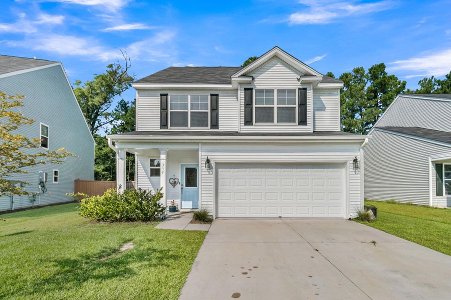 Front exterior of a new home in , Moncks Corner, SC, highlighting curb appeal (Image 21).