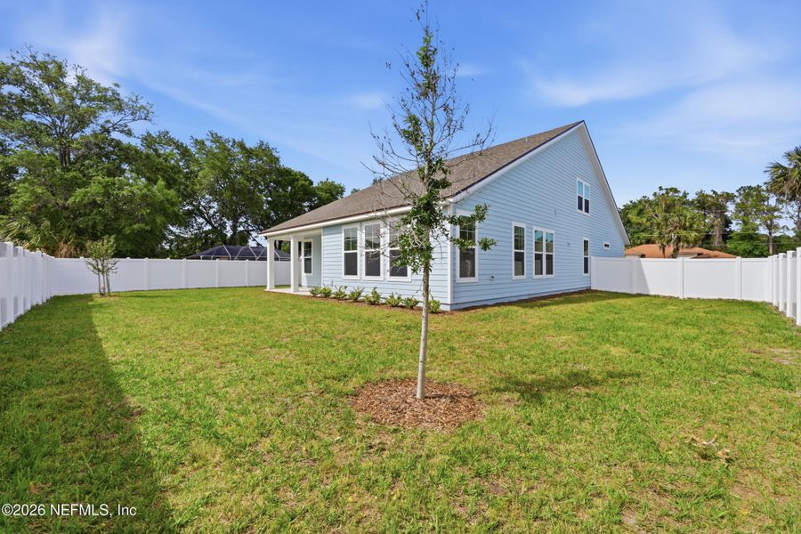 Exterior details and patio area of a home in Palm Coast Homes, Palm Coast (Image 31).