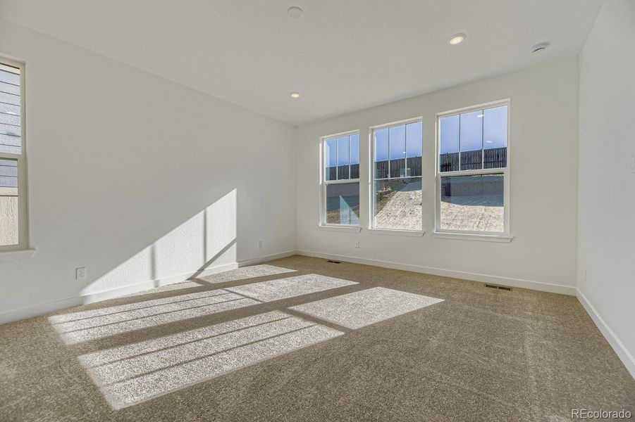 Spacious, unfurnished interior of a new home in Newlin Crossing: The Monarch Collection, Parker (Image 10). Spacious, unfurnished interior of a new home in Newlin Crossing: The Monarch Collection, Parker (Image 10).