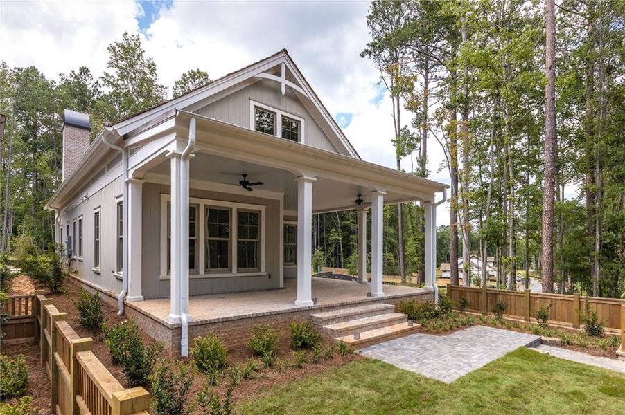 Front exterior of a new home in , Chattahoochee Hills, GA, highlighting curb appeal (Image 22). Front exterior of a new home in , Chattahoochee Hills, GA, highlighting curb appeal (Image 22).