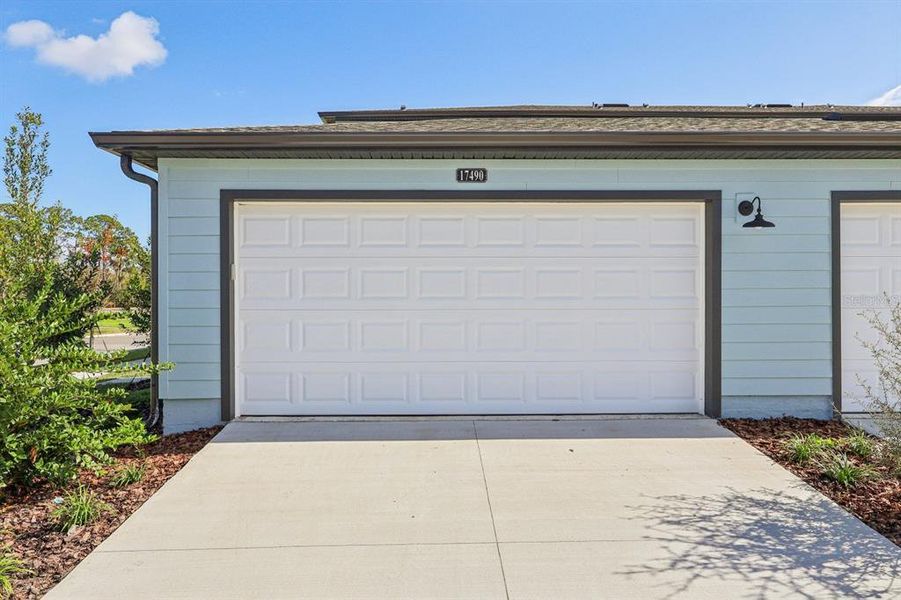 Front exterior of a new home in , Winter Garden, FL, highlighting curb appeal (Image 2). Front exterior of a new home in , Winter Garden, FL, highlighting curb appeal (Image 2).