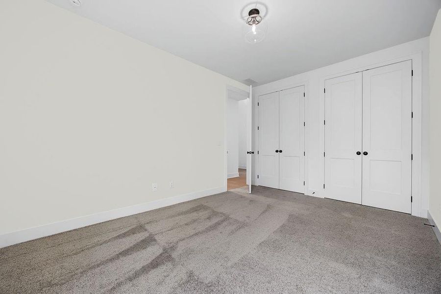Spacious, unfurnished interior of a new home in Yellowstone Farms, Cumming (Image 21).