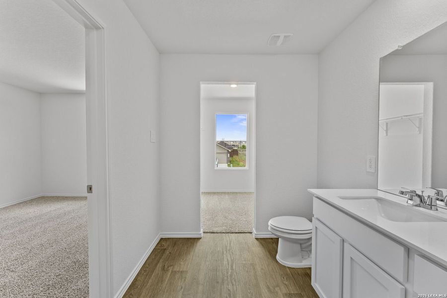 Furnished interior view inside a new home in Avenida, Converse (Image 7).