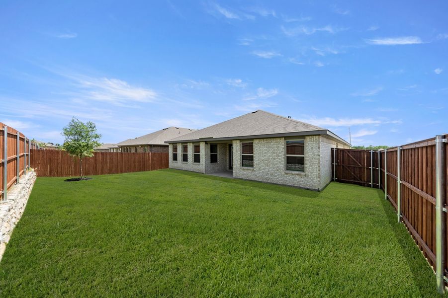 Front exterior of a new home in Northspur, Terrell, TX, highlighting curb appeal (Image 27).