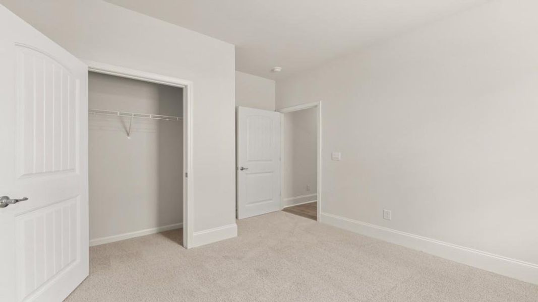 Spacious, unfurnished interior of a new home in Hamptons at Riverwood North, Dallas (Image 32).