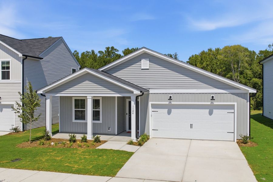 Front exterior of a new home in Carpenter Falls, Durham, NC, highlighting curb appeal (Image 29).