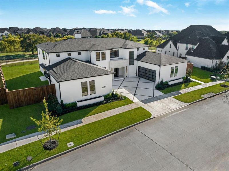 Front exterior of a new home in , Prosper, TX, highlighting curb appeal (Image 22).