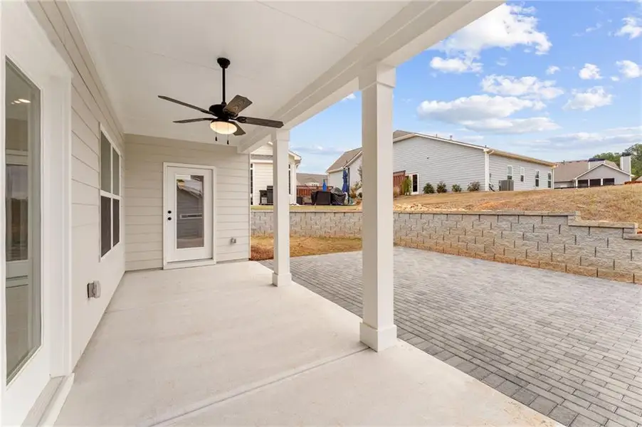 Exterior details and patio area of a home in Heritage Pointe at The Georgian, Villa Rica (Image 3). Exterior details and patio area of a home in Heritage Pointe at The Georgian, Villa Rica (Image 3).