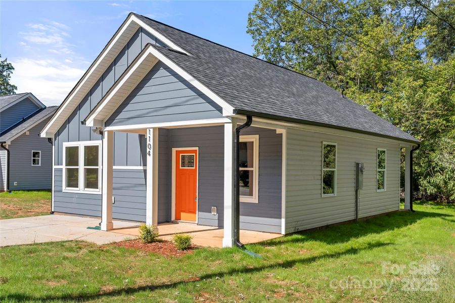 Front exterior of a new home in , Shelby, NC, highlighting curb appeal (Image 14).